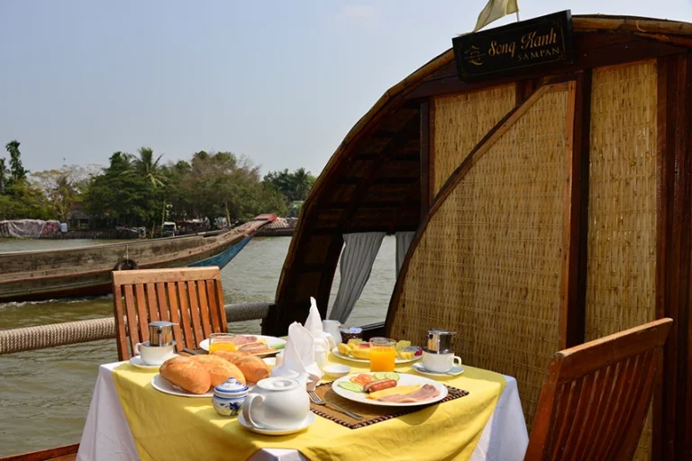 Hành trình Mê Kông (ngược dòng) File name: Bản-sao-VC_Song-Xanh-Sampan_Breakfast_PA-1-copy.webp
